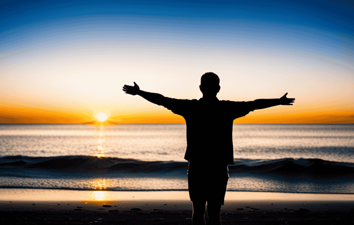 An image showcasing a serene, sunset-lit beach where a person stands with outstretched arms, radiating a vibrant aura