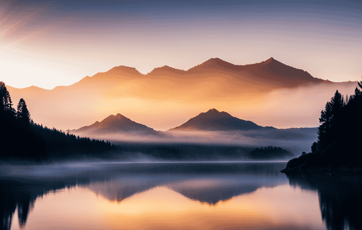 An image showcasing a serene mountain peak, bathed in the golden glow of a rising sun, casting vibrant rays of light onto a tranquil lake below, symbolizing the principles and benefits of unlocking spiritual success