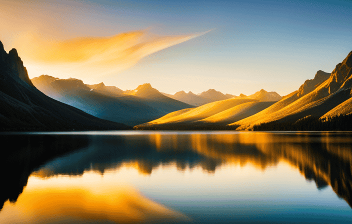 A captivating image showcasing a radiant sunrise over a serene mountain lake, casting a vibrant yellow aura upon the surroundings